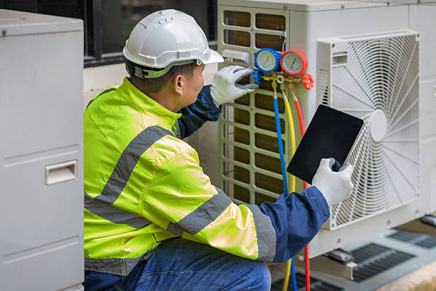 Professional Heat Pump Repair technician working in Naperville, IL